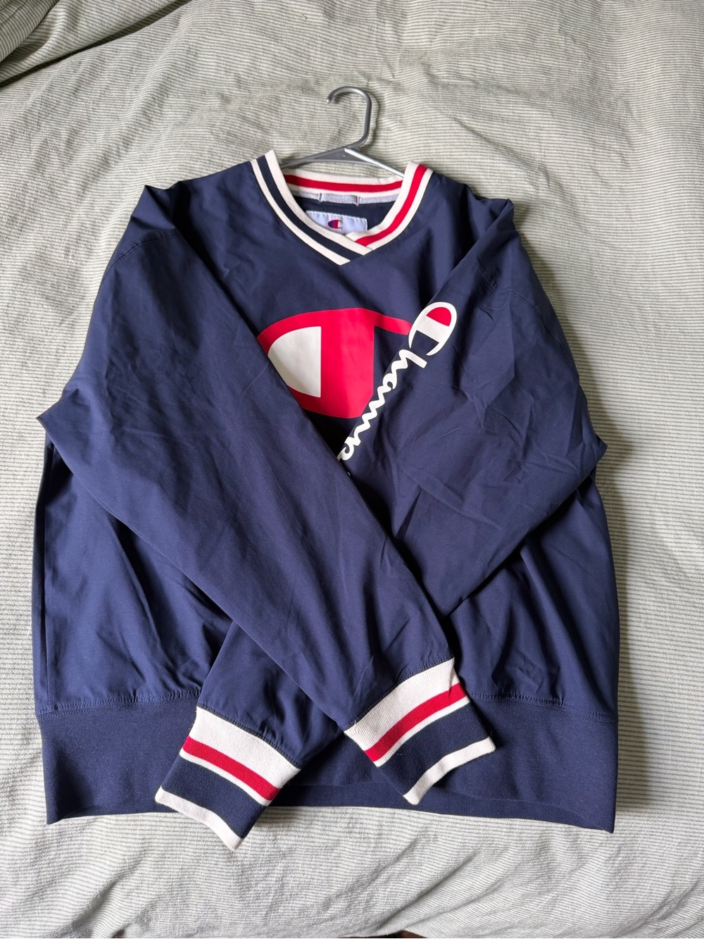 Champion navy blue long sleeve with red and white stripes